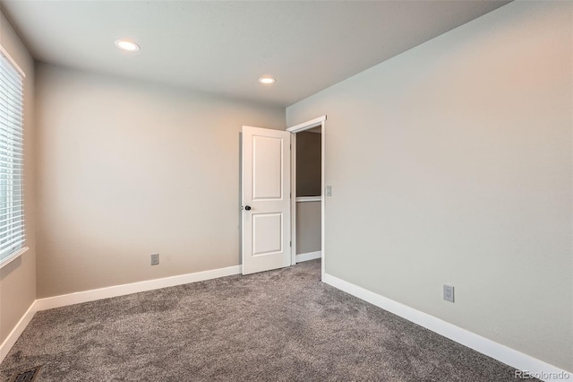 view of carpeted spare room