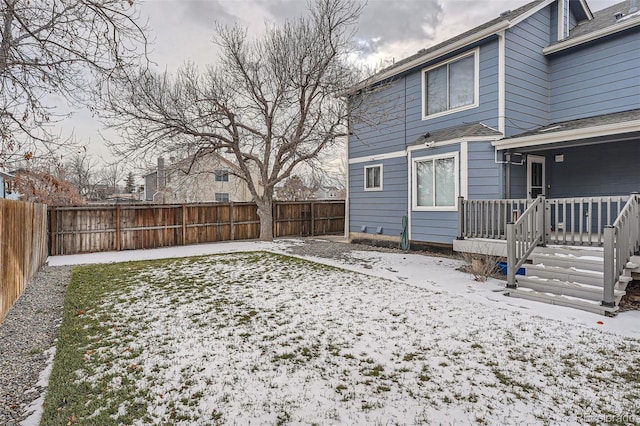 view of yard covered in snow