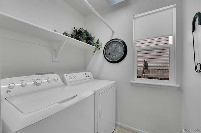 19075 E Grand Cir, Aurora, CO 80015 - laundry room with washing machine and dryer and baseboards