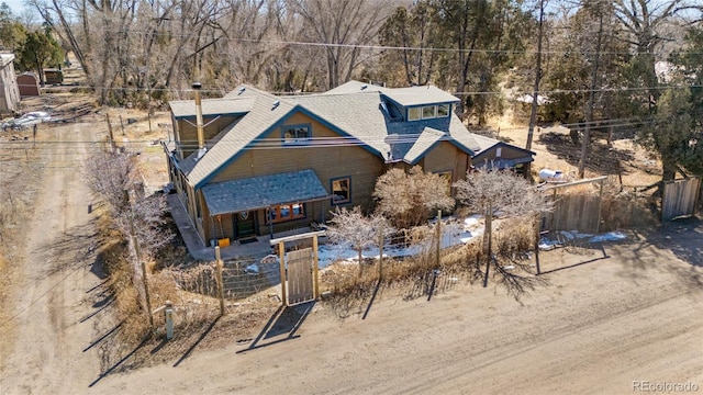 400 W Galena, Moffat, CO 81131 - view of front of property featuring a fenced front yard, a shingled roof, and a gate
