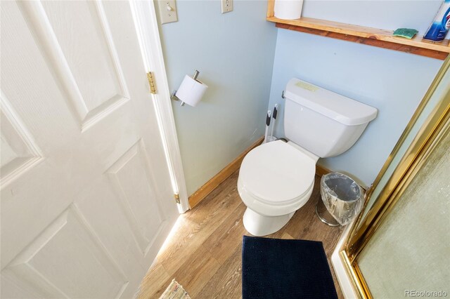 400 W Galena, Moffat, CO 81131 - bathroom with wood finished floors and a stall shower