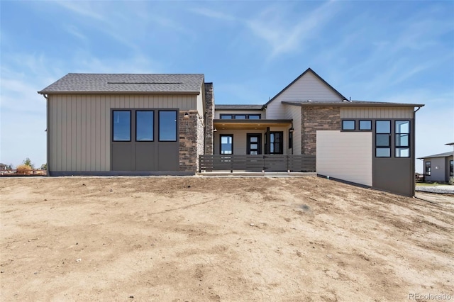 1889 Spring Bloom Dr, Windsor, CO 80550 - view of front of home with board and batten siding