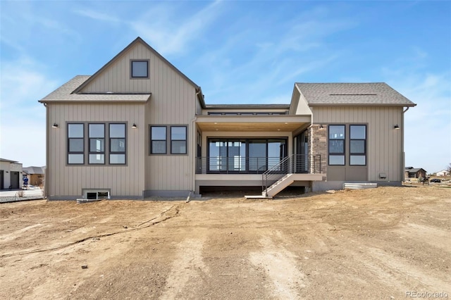 1889 Spring Bloom Dr, Windsor, CO 80550 - rear view of property featuring a shingled roof