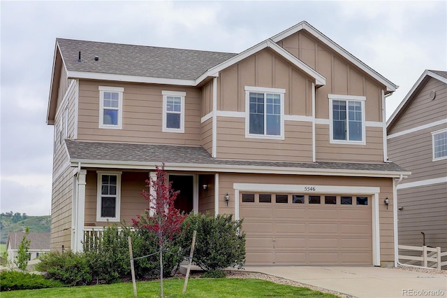 5546 Echo Hollow St, Castle Rock, CO 80104 - view of front of property featuring driveway, a garage, board and batten siding, a porch, and a shingled roof