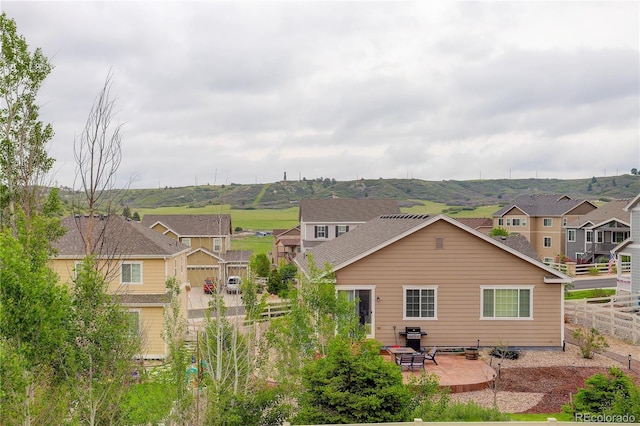 5546 Echo Hollow St, Castle Rock, CO 80104 - back of house with a patio area and a residential view