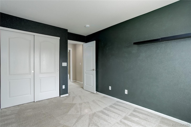 5546 Echo Hollow St, Castle Rock, CO 80104 - unfurnished bedroom with light carpet, baseboards, and a closet