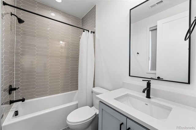 full bath featuring shower / bath combo, visible vents, vanity, and toilet