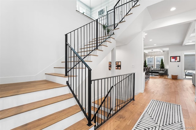 2255 S Monroe St, Denver, CO 80210 - staircase featuring wood-type flooring, recessed lighting, and baseboards