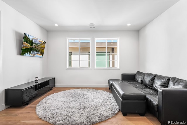 2255 S Monroe St, Denver, CO 80210 - living room with light wood-style floors, recessed lighting, and baseboards