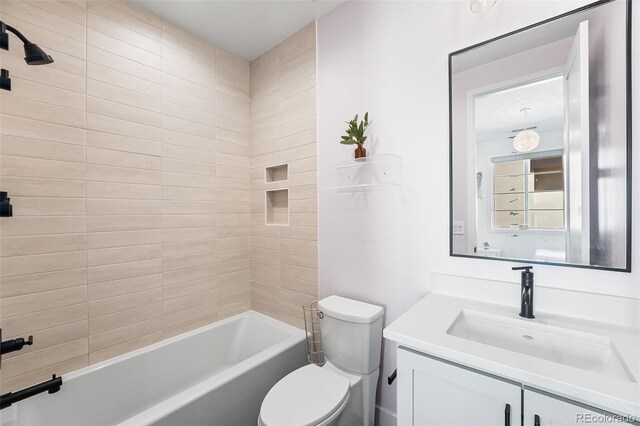 2255 S Monroe St, Denver, CO 80210 - bathroom with toilet, vanity, and bathing tub / shower combination