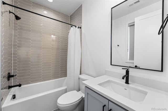 2255 S Monroe St, Denver, CO 80210 - full bathroom featuring toilet, shower / bath combo, vanity, and recessed lighting