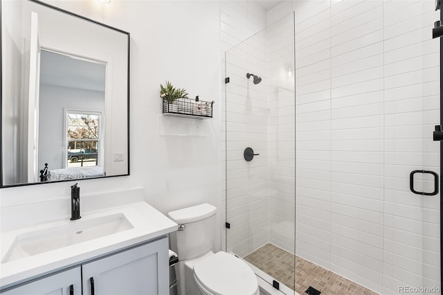2255 S Monroe St, Denver, CO 80210 - full bath with a shower stall, vanity, and toilet