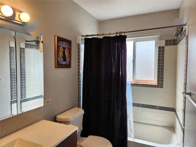 full bathroom featuring toilet, vanity, and shower / tub combo