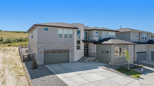 view of front of property with a garage