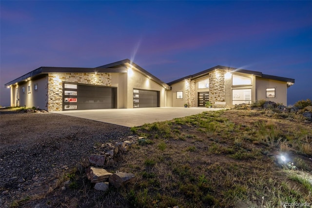 view of front of property with a garage