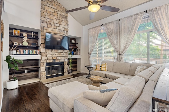 2249 Weatherstone Cir, Highlands Ranch, CO 80126 - living room with lofted ceiling, wood finished floors, ceiling fan, and a fireplace