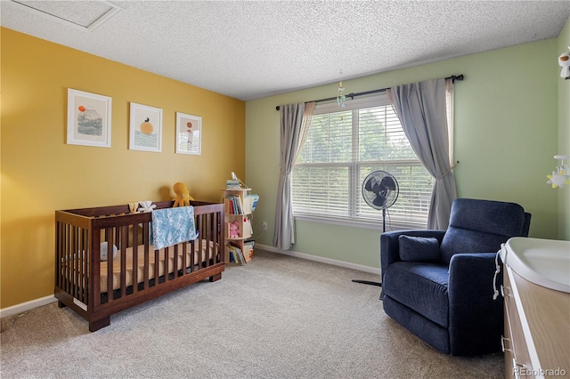 2249 Weatherstone Cir, Highlands Ranch, CO 80126 - bedroom featuring a textured ceiling, carpet floors, and a crib