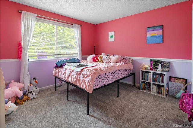 2249 Weatherstone Cir, Highlands Ranch, CO 80126 - bedroom featuring a textured ceiling and carpet flooring