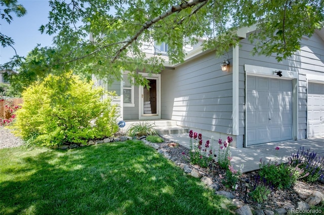 7871 Ogden Ct, Denver, CO 80229 - view of home's exterior featuring a lawn