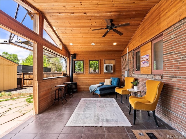 view of patio / terrace featuring ceiling fan and fence