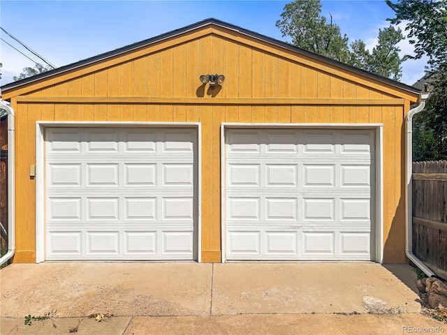 detached garage with fence