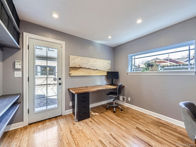 home office with visible vents, recessed lighting, baseboards, and light wood-style floors