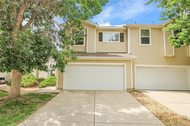 7977 S Kittredge St, Englewood, CO 80112 - view of front of home featuring an attached garage and concrete driveway