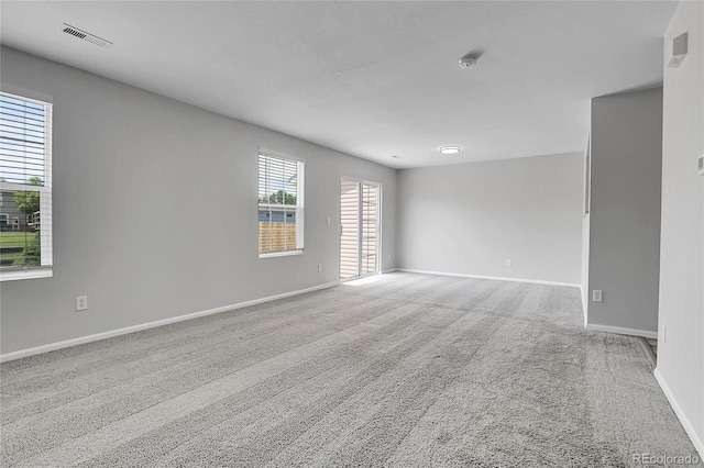 7977 S Kittredge St, Englewood, CO 80112 - empty room with carpet flooring and a smoke detector