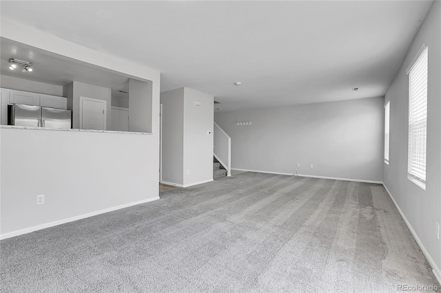 7977 S Kittredge St, Englewood, CO 80112 - unfurnished room with carpet and stairs