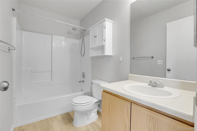 7977 S Kittredge St, Englewood, CO 80112 - bathroom with vanity, bathtub / shower combination, and wood finished floors