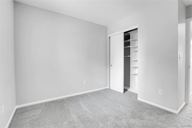 7977 S Kittredge St, Englewood, CO 80112 - unfurnished bedroom featuring carpet floors and a closet