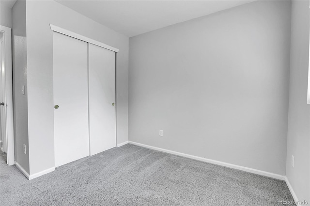 7977 S Kittredge St, Englewood, CO 80112 - unfurnished bedroom featuring carpet flooring and a closet