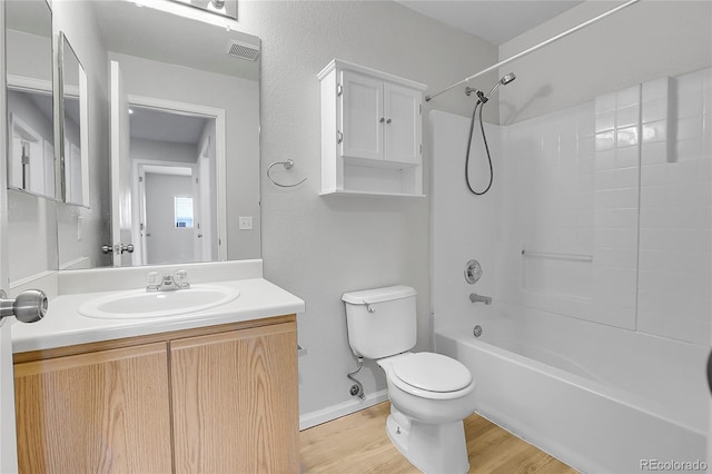 7977 S Kittredge St, Englewood, CO 80112 - full bathroom with shower / bathtub combination, vanity, and wood finished floors