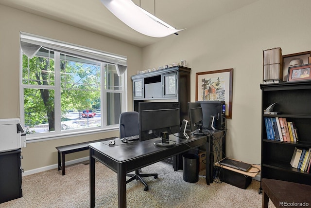 home office with light colored carpet