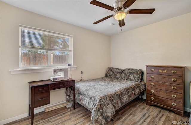 2615 Lambert Ave, Pueblo, CO 81003 - bedroom featuring wood finished floors and ceiling fan