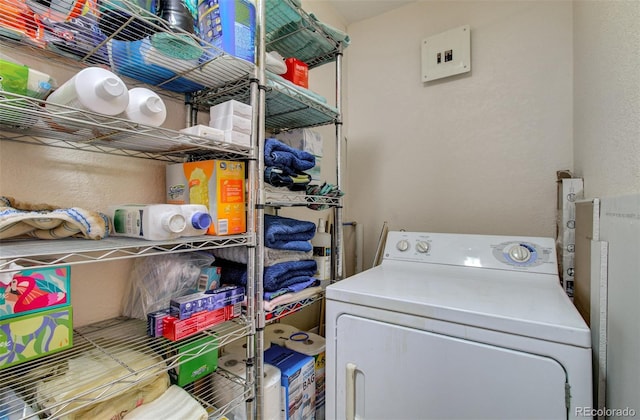 2615 Lambert Ave, Pueblo, CO 81003 - laundry room with washer / clothes dryer and a textured wall