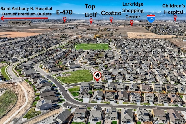 view of property location with nearby suburban area