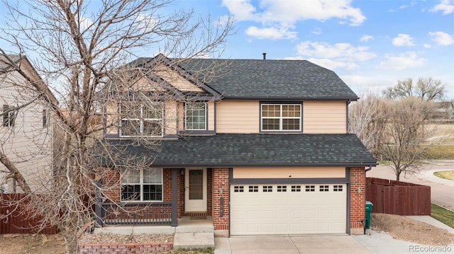 traditional-style house featuring a porch, a garage, brick siding, driveway, and roof with shingles