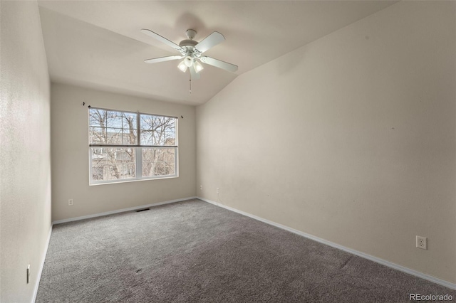 unfurnished room with carpet flooring, baseboards, a ceiling fan, and lofted ceiling