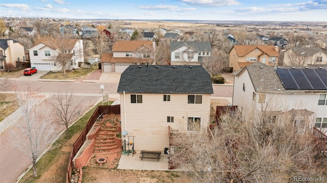 drone / aerial view with a residential view