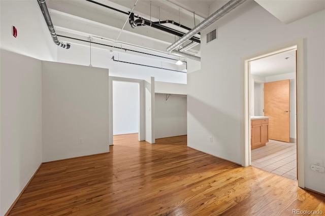 1800 Lawrence St Unit 408, Denver, CO 80202 - unfurnished room with light wood-style floors