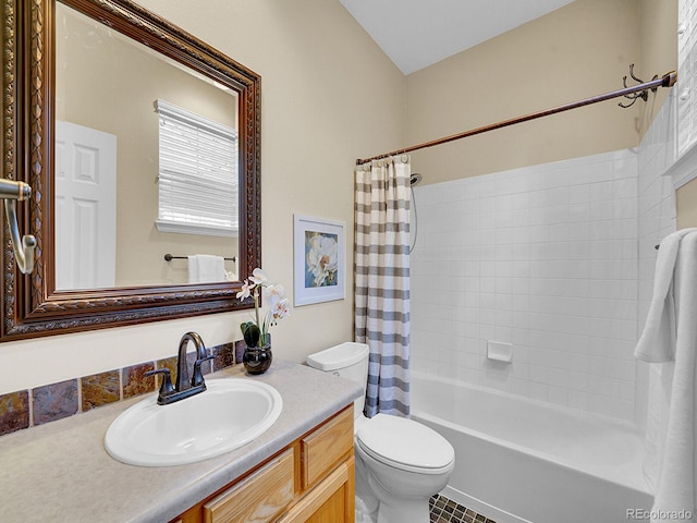 full bathroom with shower / tub combo with curtain, vanity, and toilet