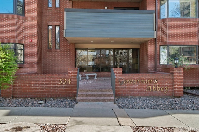 534 E 7th Ave Unit 206, Denver, CO 80203 - entrance to property featuring brick siding