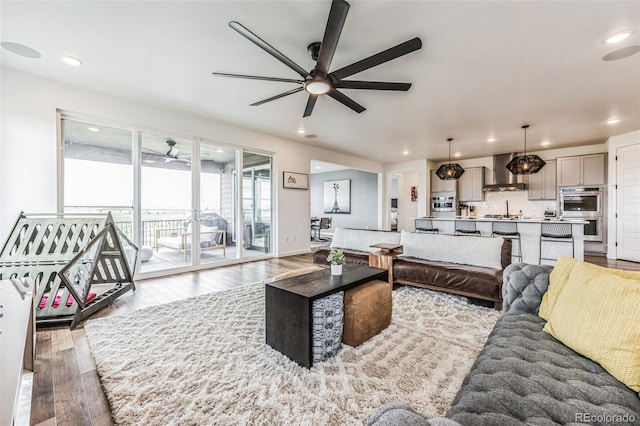 living room with light hardwood / wood-style flooring