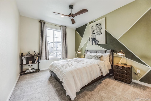 bedroom featuring ceiling fan and light carpet