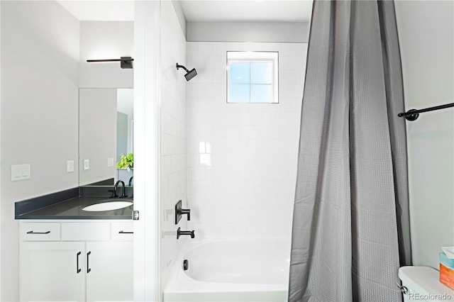 full bathroom featuring vanity, toilet, and shower / bath combo with shower curtain