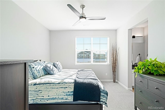 bedroom featuring light carpet and ceiling fan