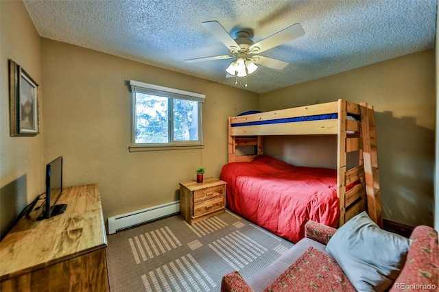 carpeted bedroom with a baseboard heating unit, a textured ceiling, and ceiling fan