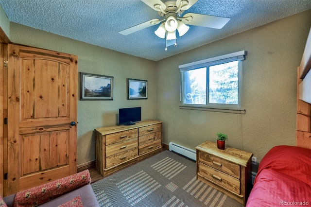 bedroom with ceiling fan, a textured ceiling, and baseboard heating