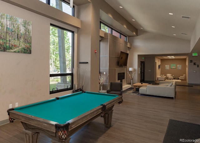 rec room featuring billiards, wood-type flooring, and high vaulted ceiling